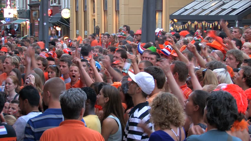 GRONINGEN, HOLLAND - JULY 11: Dutch soccer fans supporting their team during the final of the FIFA World Cup 2010 Netherlands vs. Spain - July 11, 2010 in Groningen, the Netherlands.