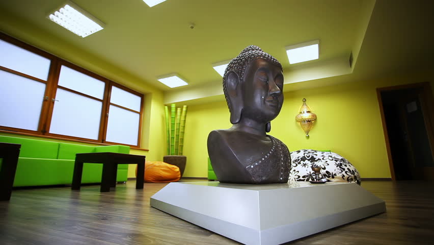 Woman performing yoga at beautiful studio. See more video from Yoga series.Young woman performing yoga at beautiful studio.