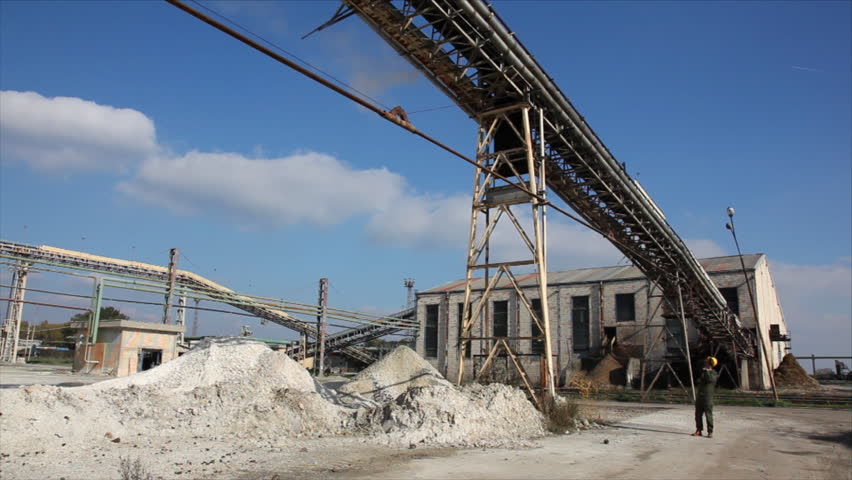 Processing Sugar Beet in Sugar Refinery.Industry exterior Pipeline, Smoke and Silo.Please see my other video, processing sugar beet.
