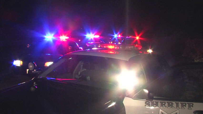 Sheriff's Patrol Cars With Flashing Police Lights