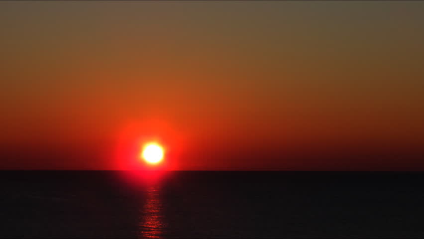 Colorful sunrise over Atlantic ocean beach time lapse