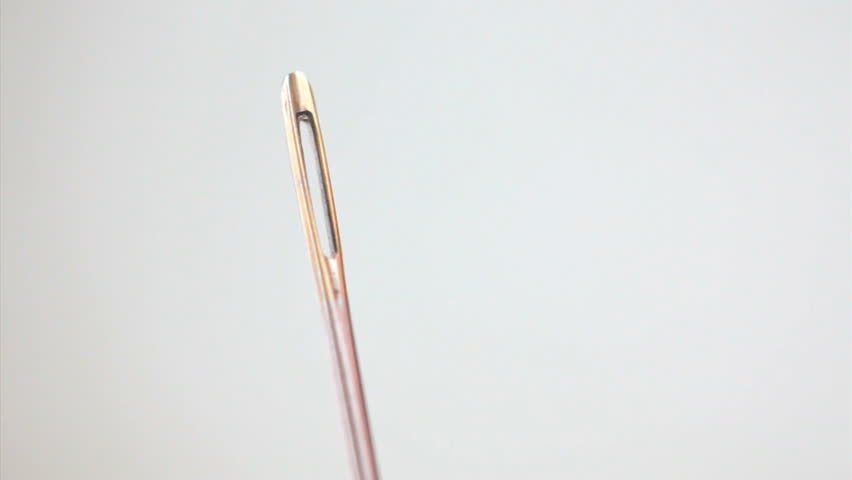 Threading the eye of a needle