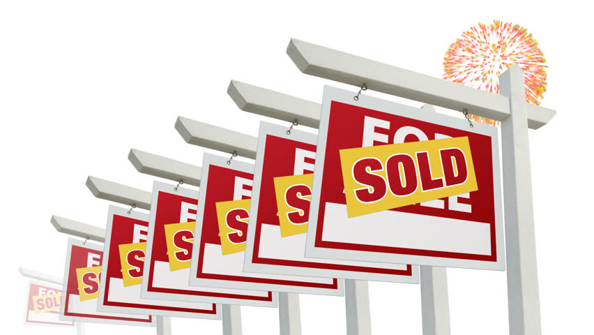 Row of Sold Real Estate Signs Lining Up with Fireworks in the White Background.