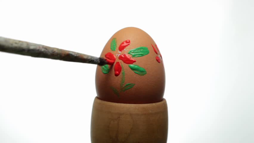 decorating an easter egg, close up