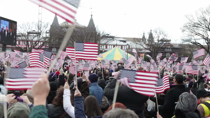 WASHINGTON, D.C. - JANUARY 21: People cheering at Presidential Inauguration January 21, 2013 in Washington, D.C.