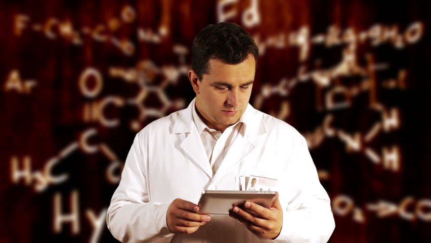 Scientist using Tablet PC with Scientific Chemistry Background