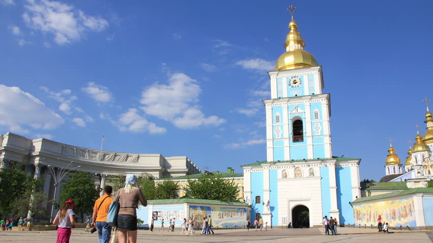 KIEV, UKRAINE - JUNE 3: People near Mikhailovsky Golden-Domed Monastery on Mikhailovskaya square in Kiev, Ukraine, June 3, 2012