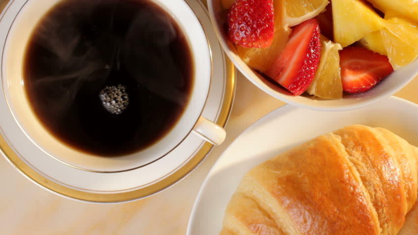 Pouring coffee at breakfast