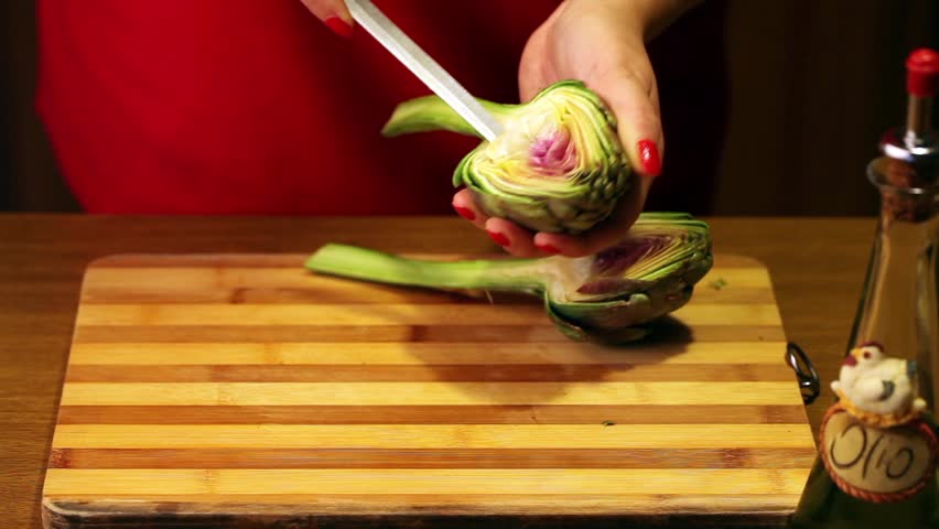 Recipes - Eggs Baked In Artichokes - Time lapse in full HD showing the preparation of baked eggs in artichoke halves.