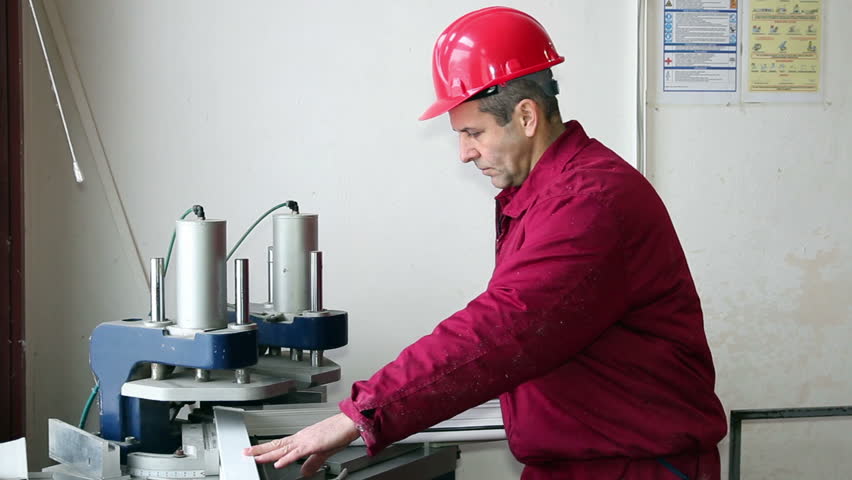 Worker Checking Quality of Weld. Worker controls the angle of the window. HD1080p.