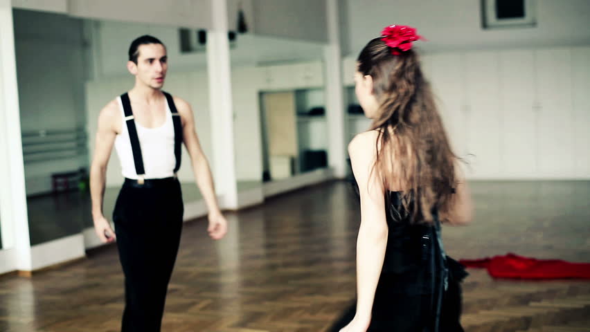 Montage of professional dancers dancing tango in ballroom. Edited Sequence. 
