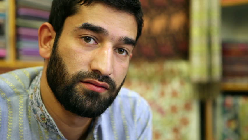 Asian male beauty. Seller of Pashmina originally from Kashmir.