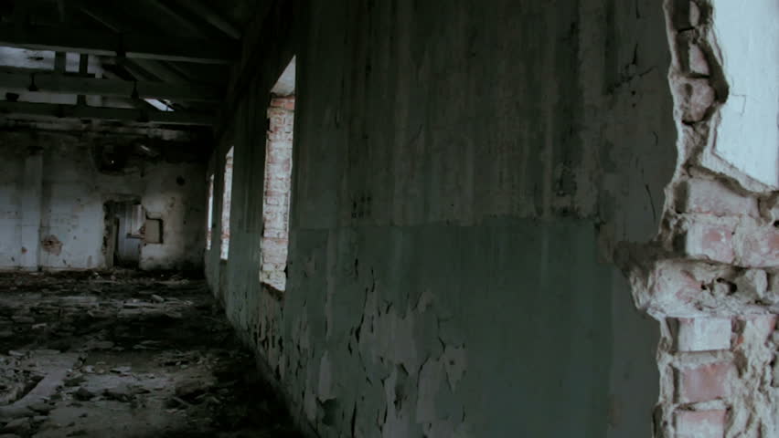 Panning through an abandoned factory hall.