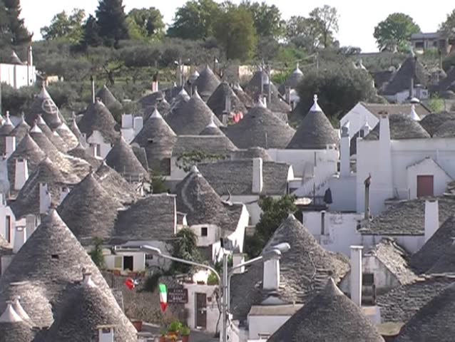Alberobello is famous for his trulli. A trullo is a traditional Apulian stone dwelling with a conical roof.