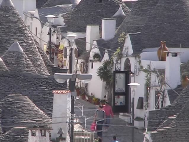 Alberobello is famous for his trulli. A trullo is a traditional Apulian stone dwelling with a conical roof.