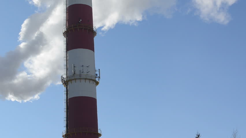 smoke vapour fume rise industrial factory chimney panorama on background of blue sky. boiler-house heating all city houses in winter.