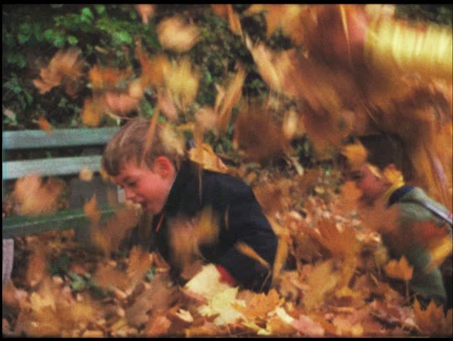 Vintage 8mm film: Children play with leaves, 1960s