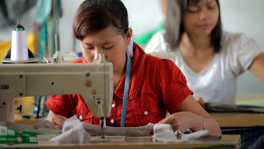 BALI - MARCH 5. Women stitching in small workshop on March 5, 2012 in Bali, Indonesia. Since entering the CAFTA (asian free trade agreement) Bali has difficulties competing with China.
