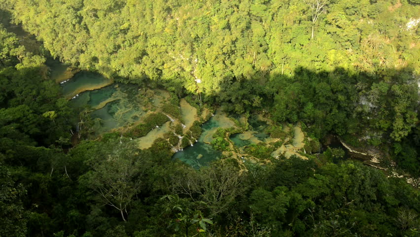 Semuc Champey natural attraction tucked away in the mountains of an isolated jungle in Guatemala.