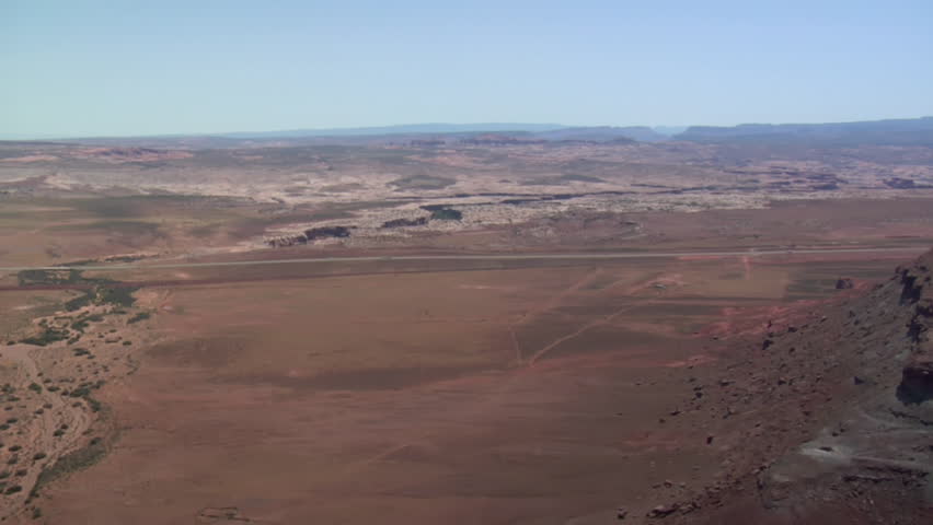 aerial shots of red rock desert buttes