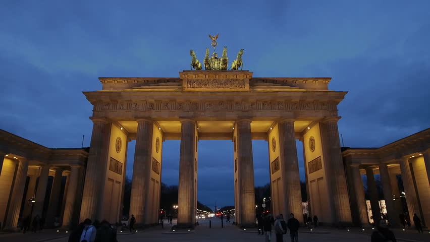 Time lapse night shot of Brandenburg gate in Berlin one of the most well known landmarks of Germany