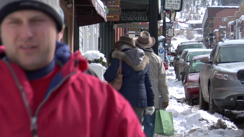 PARK CITY, UTAH - CIRCA 2010: tourists on Main Street in the wintertime