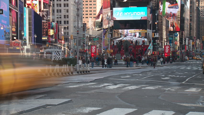 NEW YORK - MARCH 10: (Time-lapse) Vehicular and pedestrian traffic move through Times Square at the intersection of 7th Avenue and 45th Street on March 10, 2013 in New York.