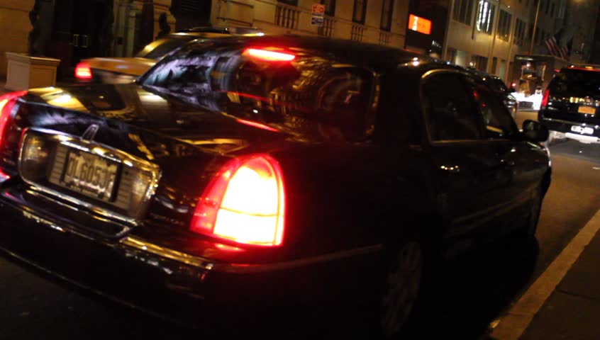 New York, NY - Circa 2012: Limousine in NYC at night Pulling out