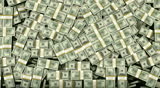 Stack of $100 Dollar Bills rolled up and bound together falls from the top of the screen into the bottom where they pile up and eventually fill the entire screen. There is an alpha channel video.