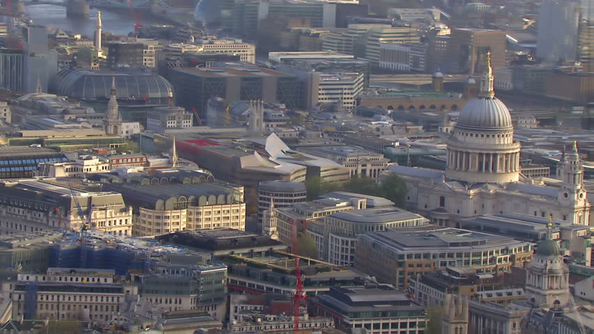 Aerial view over London and St. Paul's Cathedral. The river Thames can be seen in the background