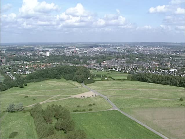 Fly over Mount Saint Peter to suburbs Maastricht, The Netherlands