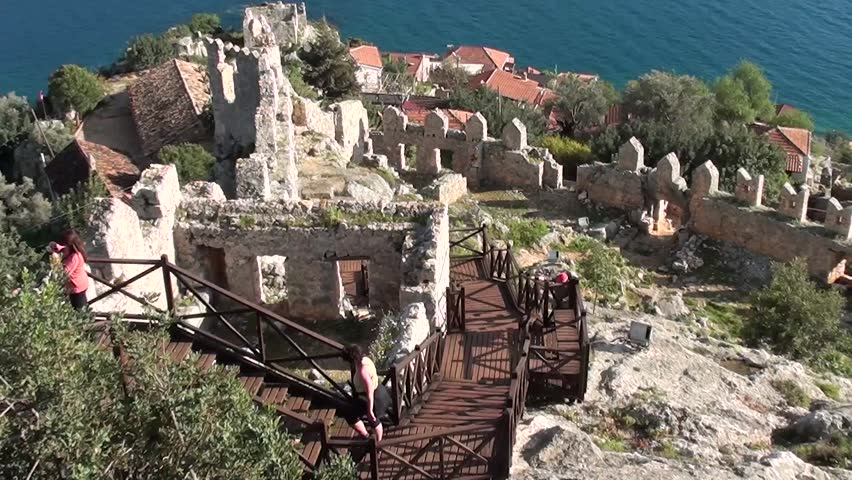SIMENA, Turkey â March 17, 2013: Old Fortress wall and modern stairs