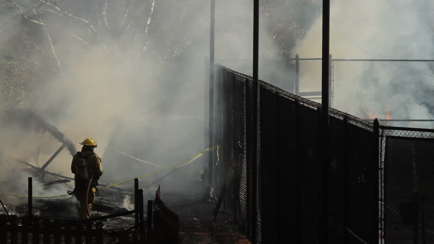 Firefighters extinguishing fire at daycare