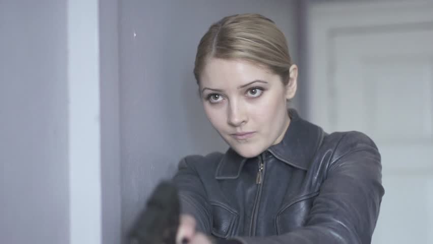 women shooting gun