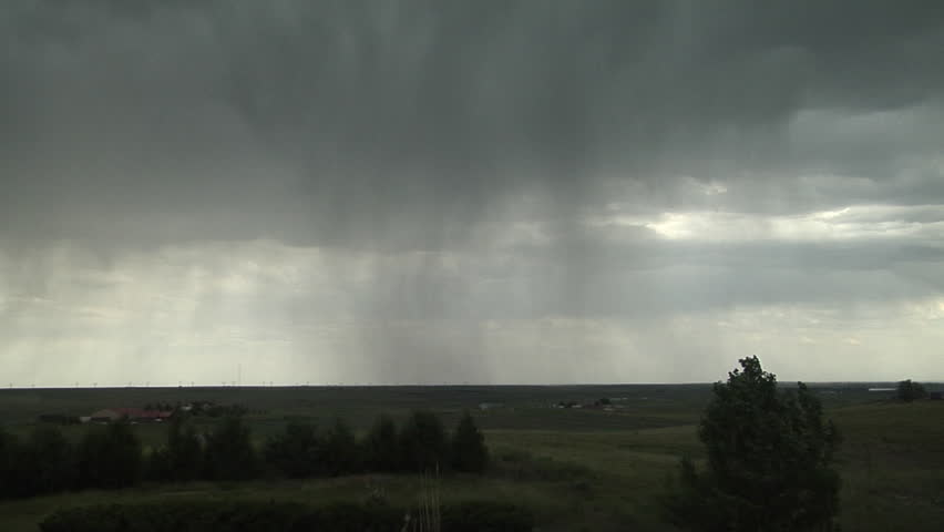 High Base Thundershower. Streamers of rain and virga mark a plains storm with high cloud bases