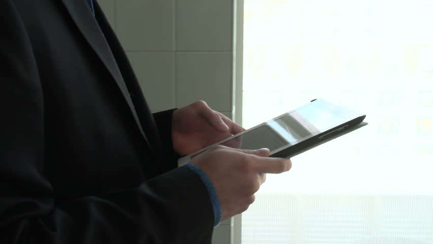 Business man on his tablet