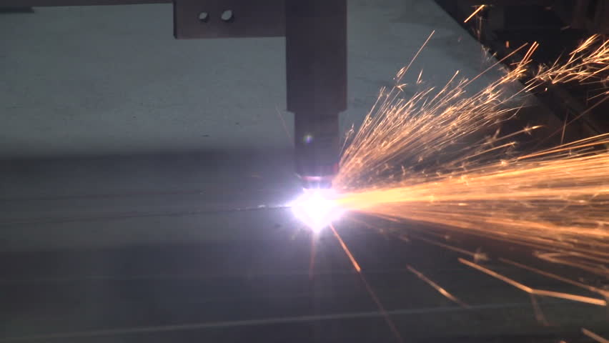 Close up of plasma cutter with sparks