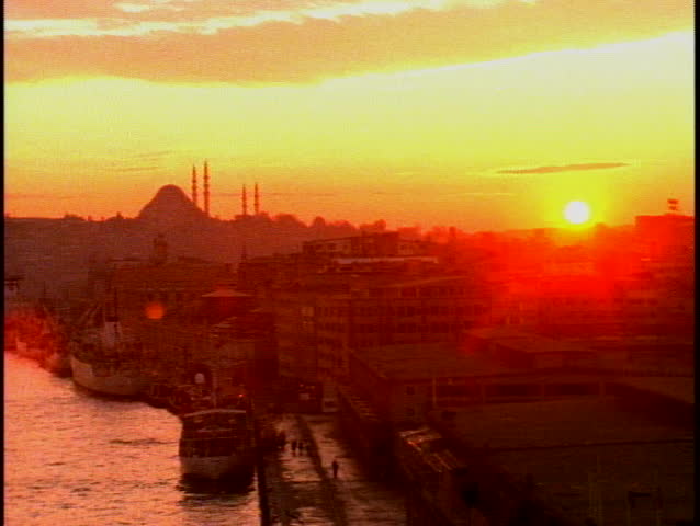 Istanbul sunset with mosques and minarets, silhouette
