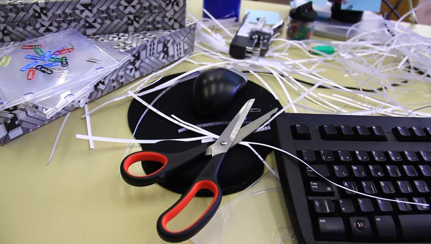 Chaotic office, bad worker, mess and all sorts of supplies.