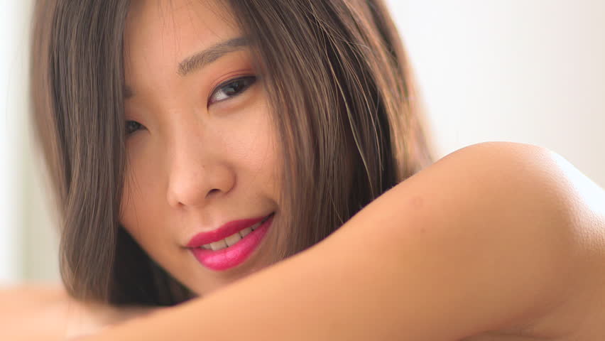 Closeup of happy Chinese woman