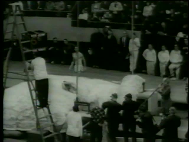Former pole vault record holder J.Uelses hits a cross bar at the track season of The Knights of Columbus meet in Boston circa 1964-MGM PICTURES, UNIVERSAL-INTERNATIONAL NEWSREEL, USA, filmed in 1964  