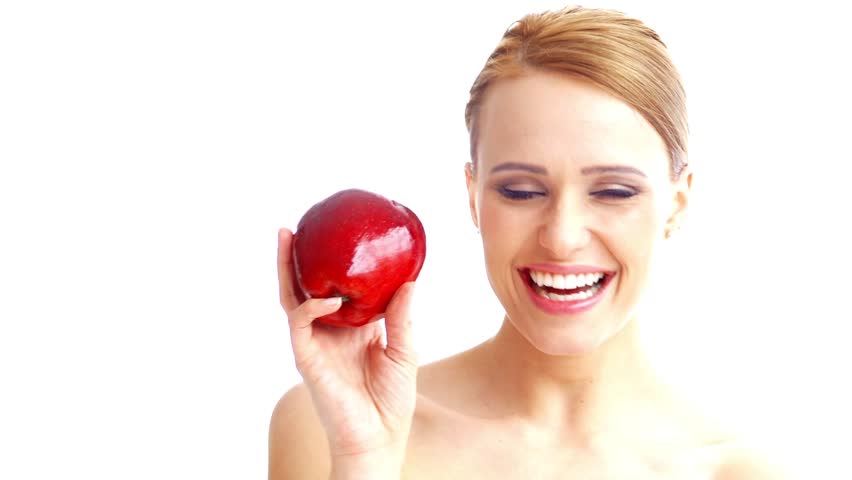 Hilarious Woman Holding Red Apple on White Background

