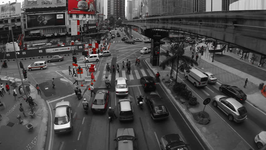 KUALA LUMPUR - MARCH 21:  (color grading) panning time lapse of  traffic on Jalan Bukit Bintang in Kuala Lumpur Malaysia on 21 March 2013