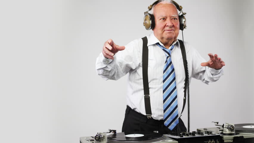a very funky elderly grandpa dj mixing records
