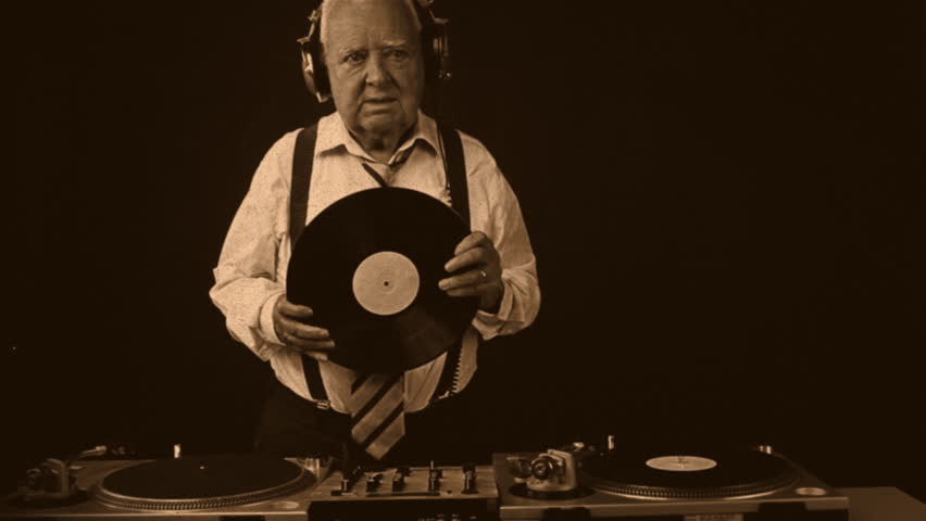 a very funky elderly grandpa dj mixing records
