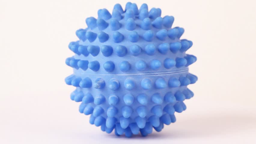 Blue spiky ball - toy for dogs isolated on white background