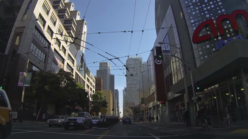 SACRAMENTO CALIFORNIA MAR 2013: Downtown Sacramento California driving Point Of View. Capital of California and home of legislator. Tall cityscape building, offices and business.