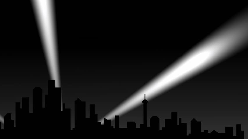 City silhouette with spotlights.