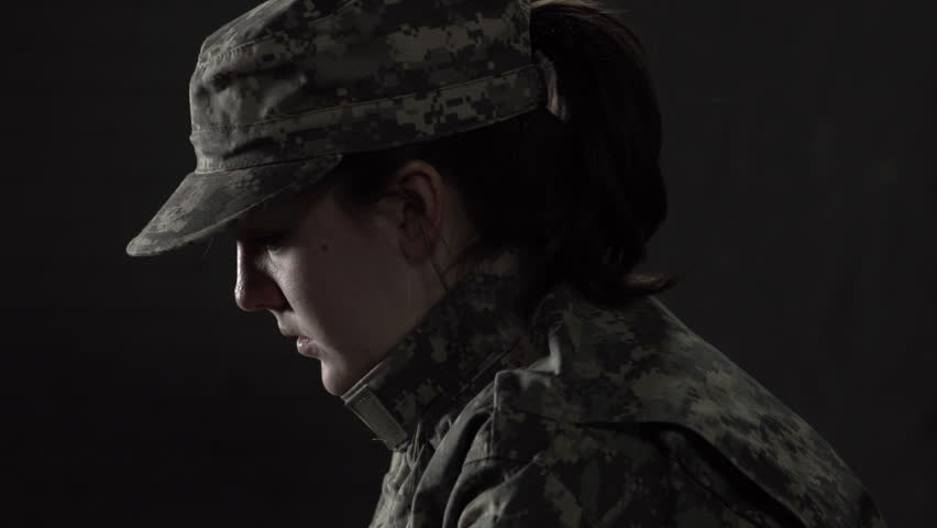 Military woman struggling with Post Traumatic Stress Disorder gets support from fellow soldier