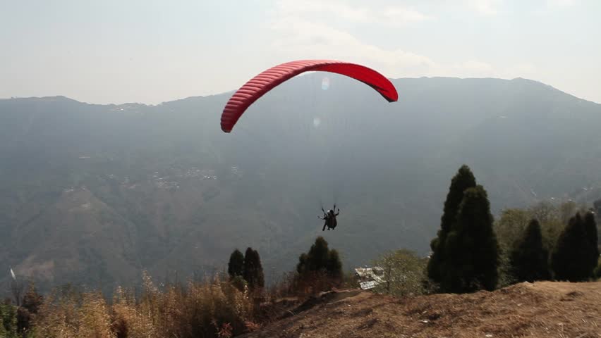 Paragliding in Himalaya. Take-off.